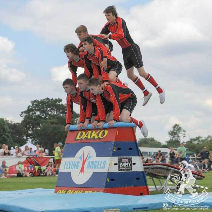 display-team A pyramid of gymnasts on a vaulting box.